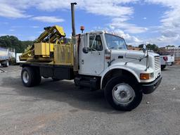 1996 International 4700 with Sterling Guard Rail Post Driver.