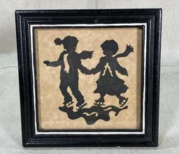 Silhouette of Children on Ice Skates