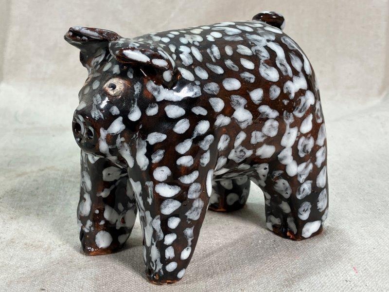 Three Pottery Pigs