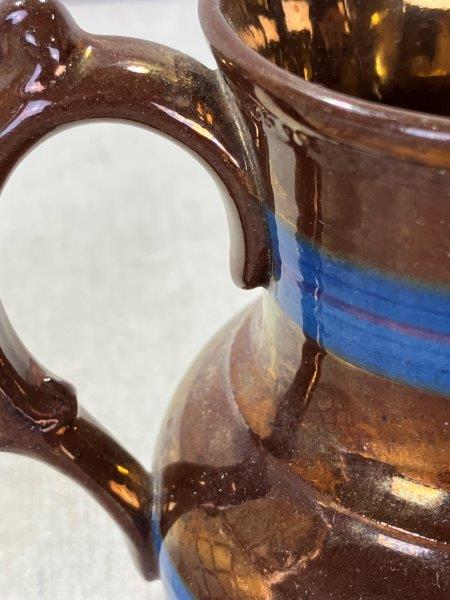 Two Decorative Pitchers