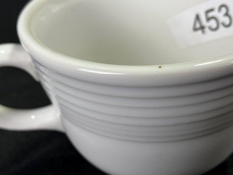 Fiestaware Teacups, Saucers, and Assorted Dinnerware