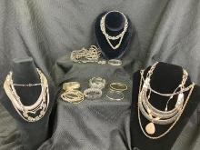 Costume Jewelry Assortment Featuring Necklaces and Bracelets