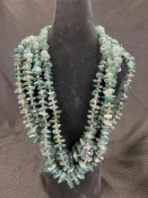 Group of Four Green Kyanite and Gold Tone Bead Necklaces