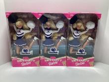 Three Penn State University Barbie Dolls