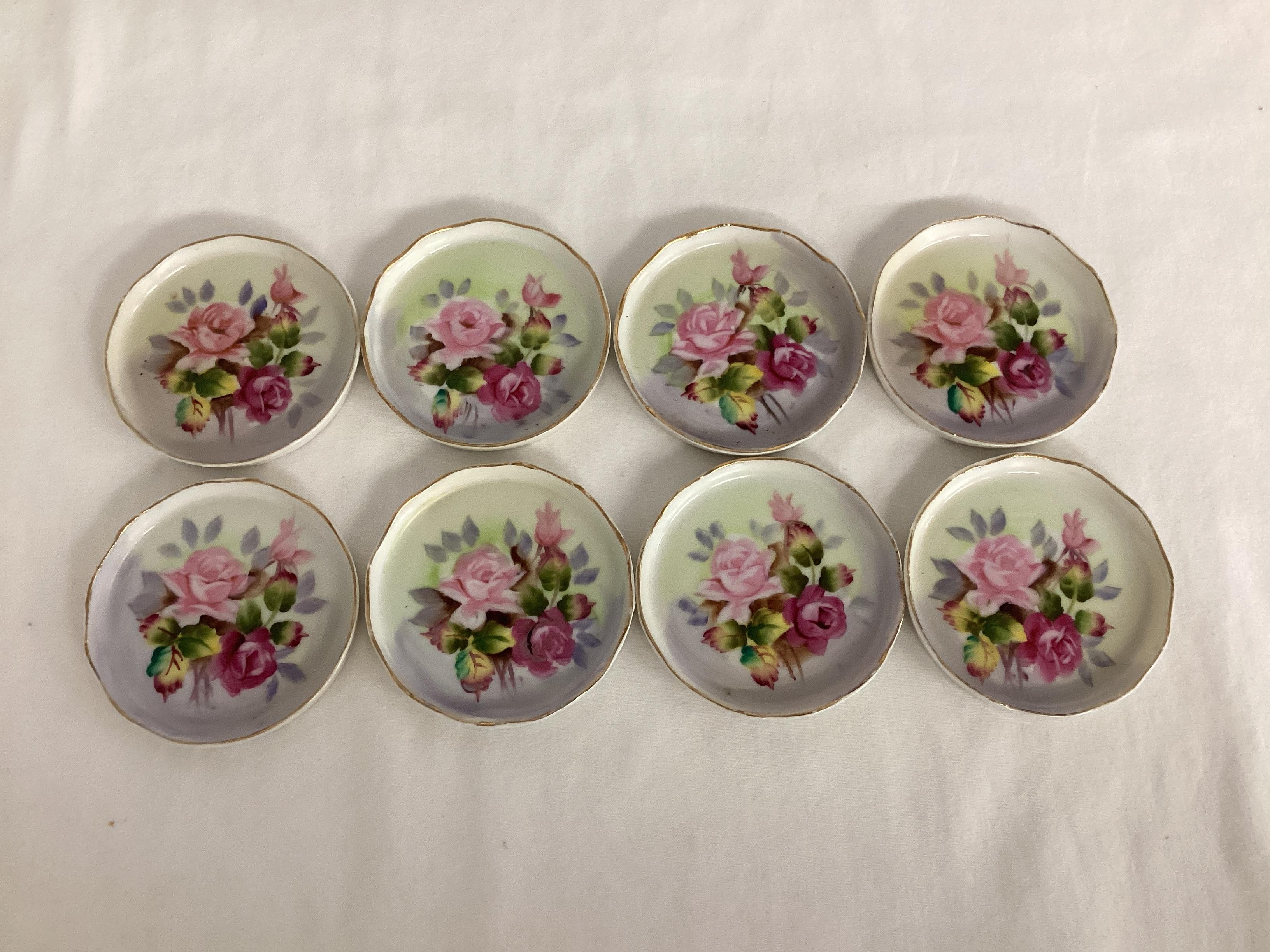 Eight Lefton Hand Painted Coasters