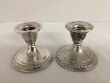 Two La Pierre Weighted Sterling Silver Candlesticks
