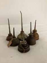 Six Vintage Oil Cans