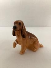 Royal Doulton Cocker Spaniel with Bandaged Leg Figurine