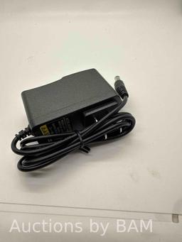 AC/DC adapter Model 0910 DC9V 1A