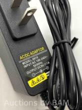 AC/DC adapter Model 0910 DC9V 1A