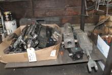 Used cylinders under steel work bench