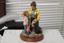 Red Hat of Courage Figurine