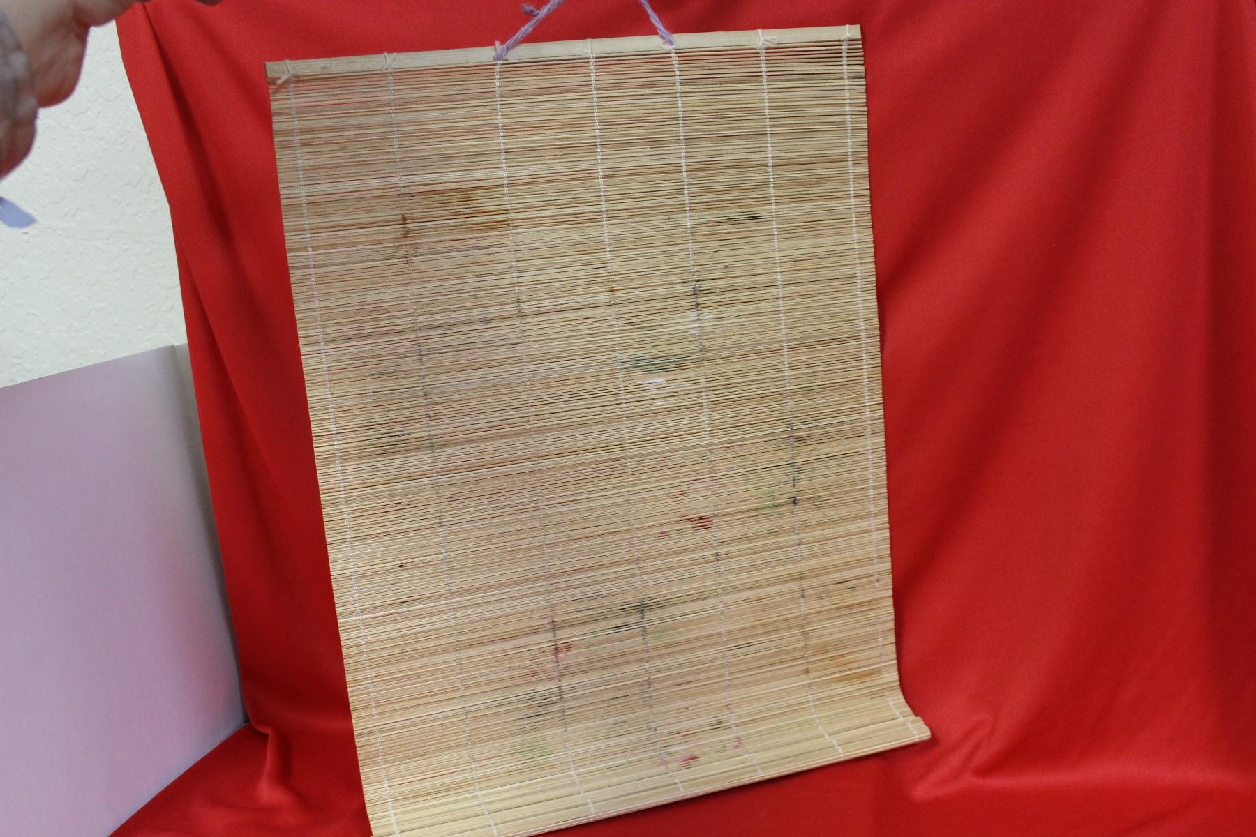 A Rattan Hand Painted Mat