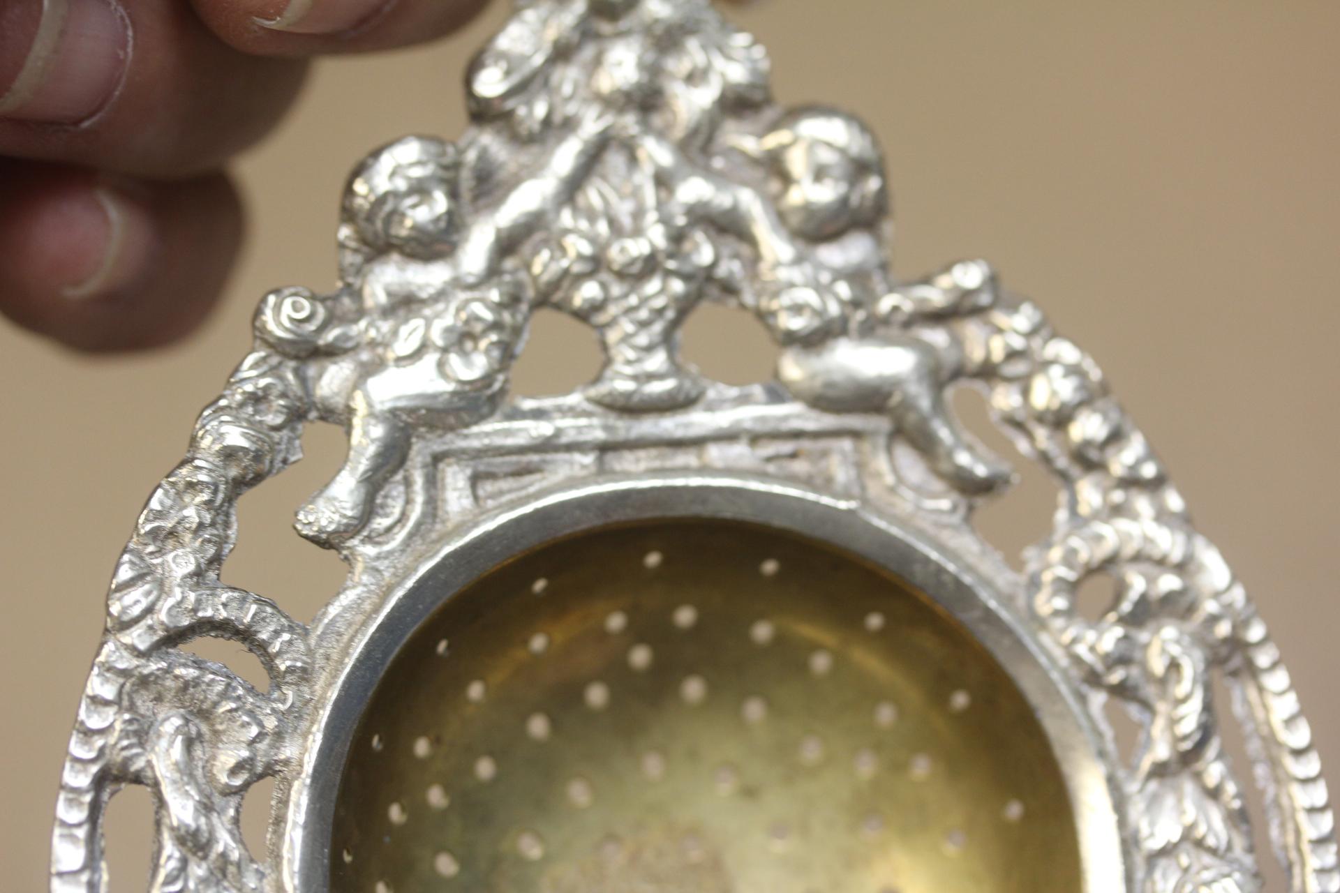 Ornate Silverplate Tea Strainer