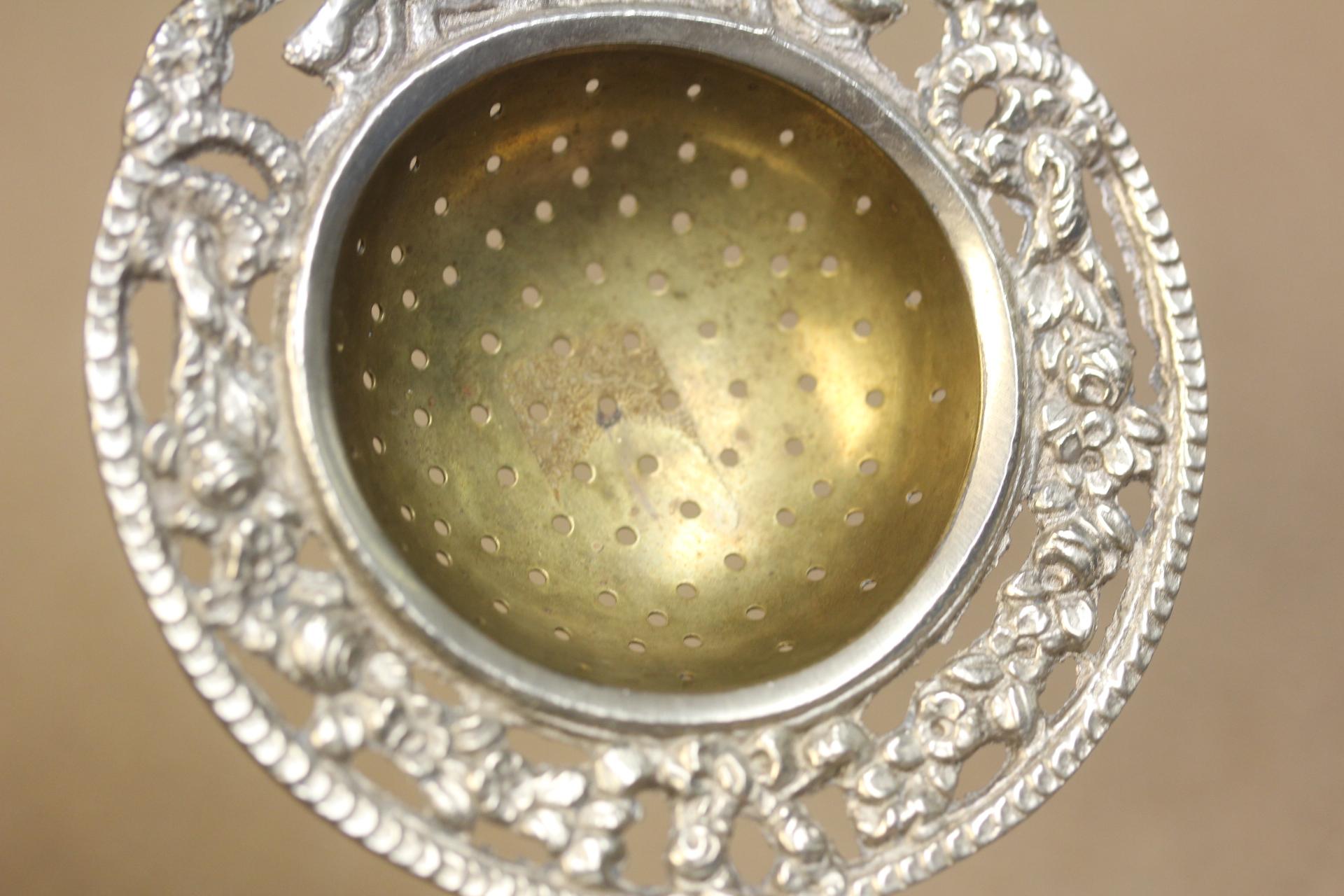 Ornate Silverplate Tea Strainer