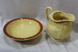 A Ceramic Pitcher and Undertray