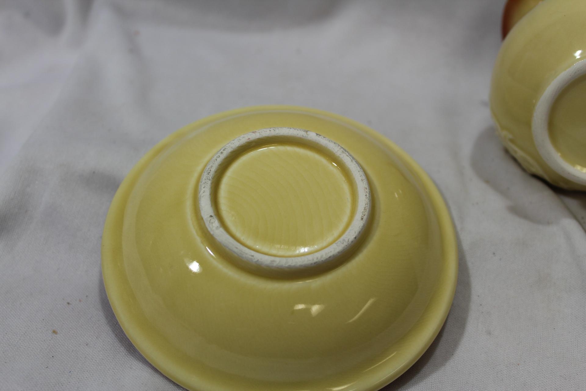 A Ceramic Pitcher and Undertray