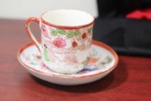 A Japanese Geisha Girl Cup and Saucer