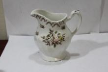 A Ceramic Pitcher/Creamer