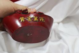 A Resin Buddha Figurine