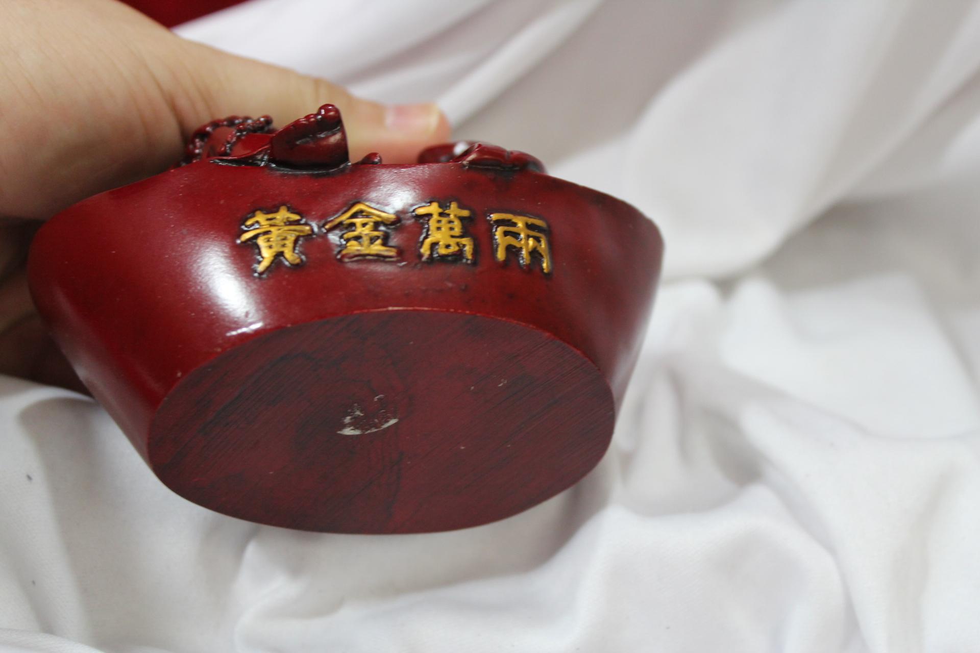 A Resin Buddha Figurine