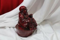 A Resin Buddha Figurine