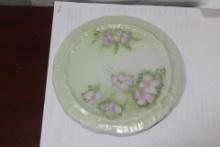 A Signed Porcelain Trivet
