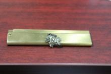 A Vintage Hide Away Metal Comb