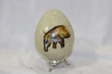 A Painted Stone Egg on Stand