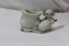 A Vintage Ceramic Shoe with Dog