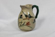 A Japanese Pottery Pitcher