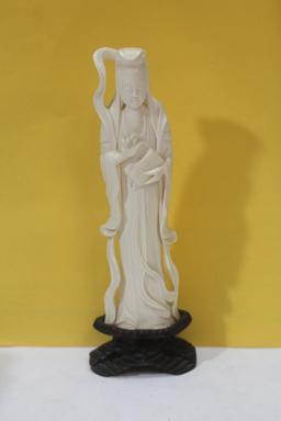A Carved Bone Figurine