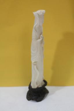 A Carved Bone Figurine