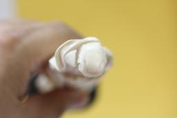A Carved Bone Figurine