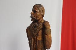 A Wood Statue of a Cowboy