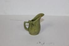 A Miniature Pottery Pitcher