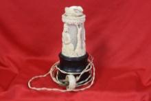 A Carved Bone Lamp