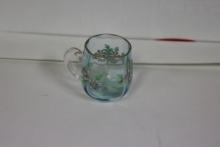 A Miniature Teal Coloured Glass Cup