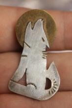 A Sterling and Copper Brooch