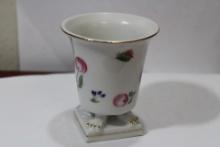 A Signed Cup on Stand