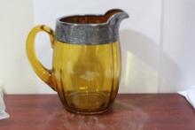 A Silver Overlay Amber Glass Pitcher