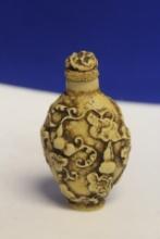 A Carved Resin Snuff Bottle