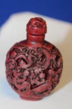 A Carved Resin Snuff Bottle