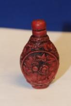 A Carved Resin Snuff Bottle