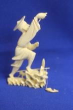 A Carved Chinese Fisherman