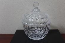 A Facet Glass Jar With Lid