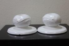 A Set of Two Pottery Candlesticks