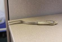 Inlaid bird form fork