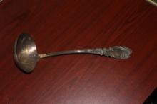 An Ornate Silverplated Laddle