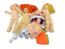 FOUR 1980'S CABBAGE PATCH DOLLS INCLUDING THREE BY XAVIER ROBERTS